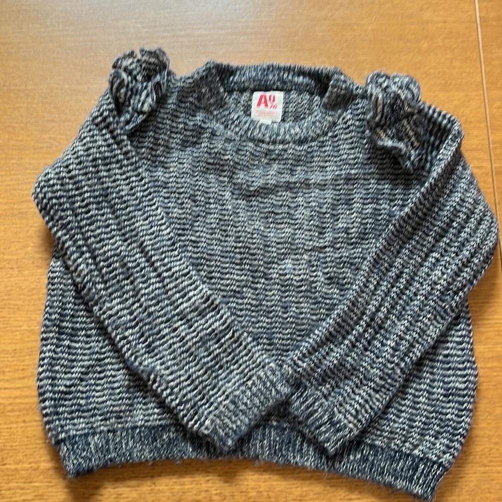 A076 mohair sweater with ruffles size 6